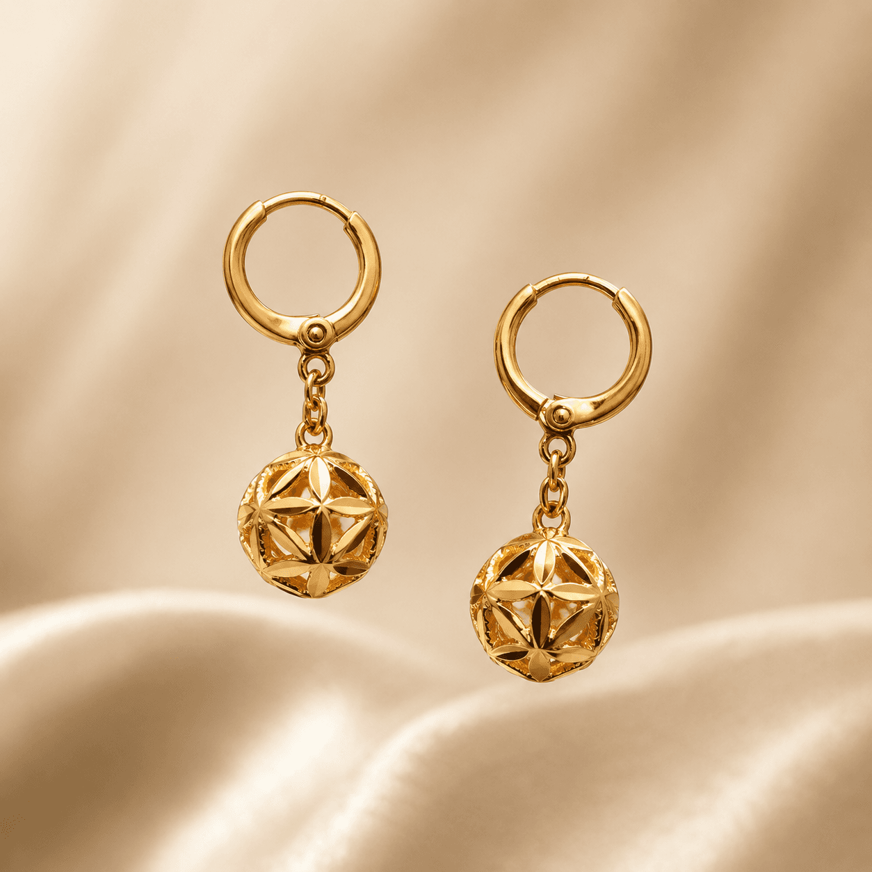Pendientes Constelación — composición flotante